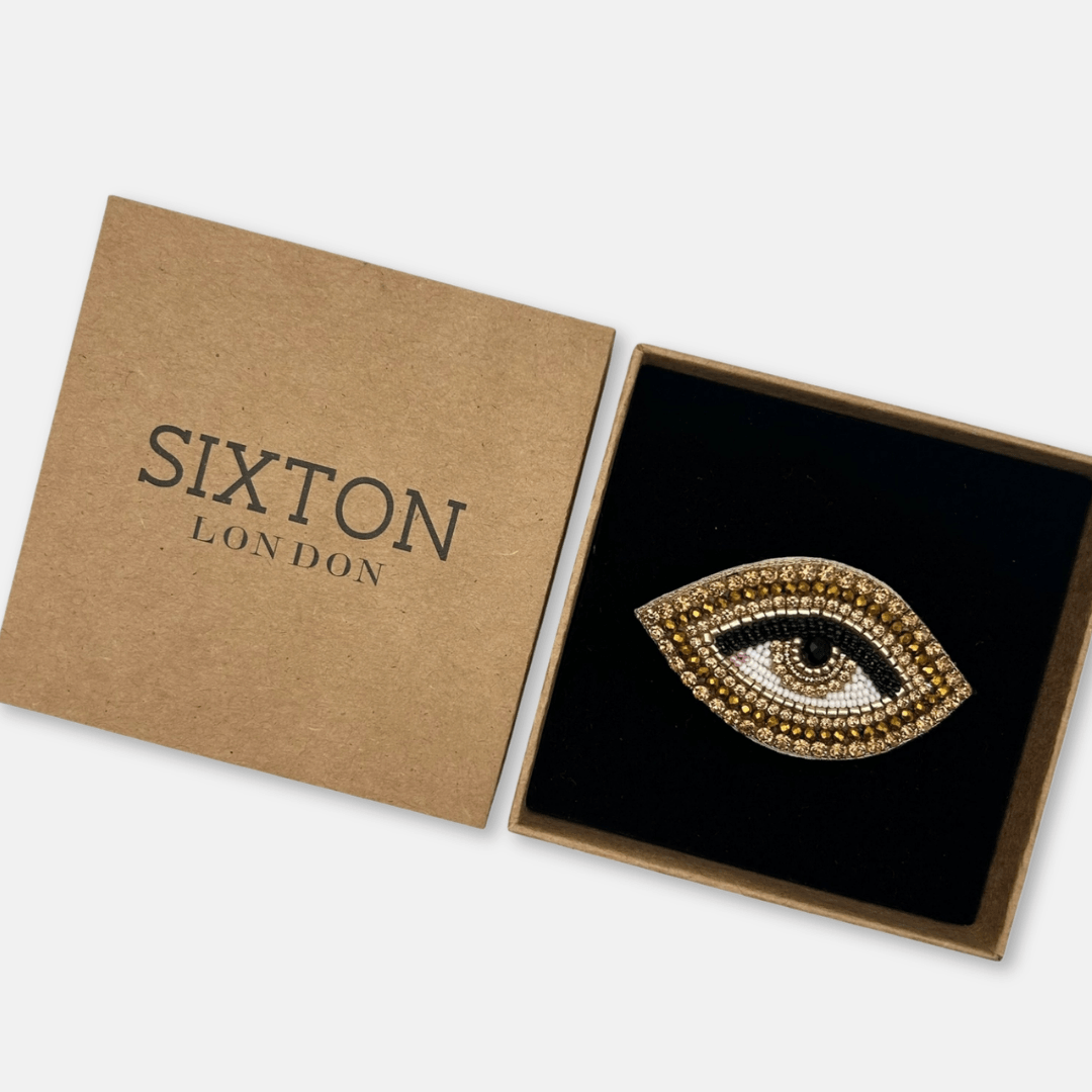 Gold Beaded Eye Brooch